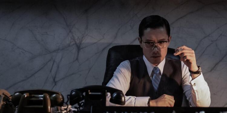 The Man Standing Next